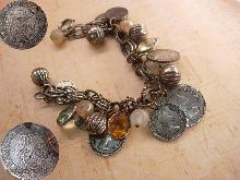 Vintage chunky Charm bracelet South african and Sweden coins and baubles