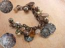 Vintage chunky Charm bracelet South african and Sweden coins and baubles