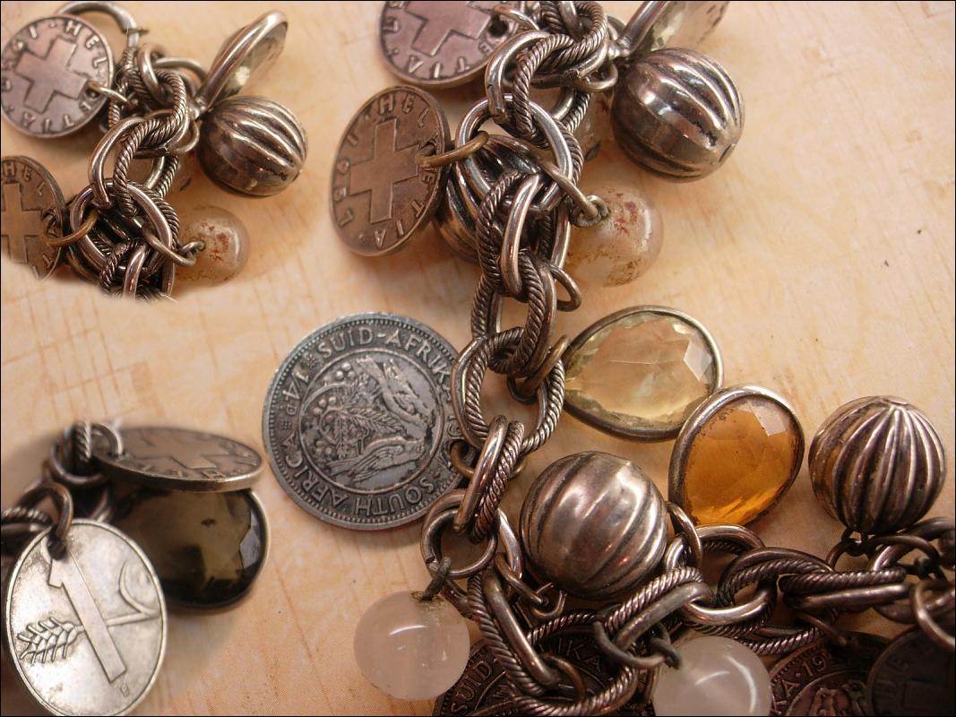 Vintage chunky Charm bracelet South african and Sweden coins and baubles