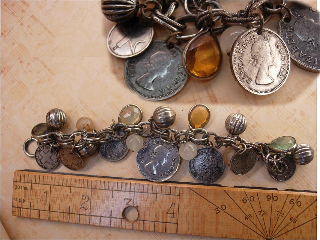 Vintage chunky Charm bracelet South african and Sweden coins and baubles