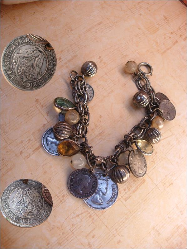 Vintage chunky Charm bracelet South african and Sweden coins and baubles