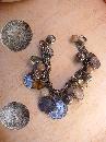 Vintage chunky Charm bracelet South african and Sweden coins and baubles