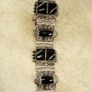 Vintage Nouveau sterling Bracelet Gorgeous metal work hinged signed black onyx Etruscan work