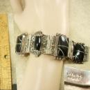Vintage Nouveau sterling Bracelet Gorgeous metal work hinged signed black onyx Etruscan work