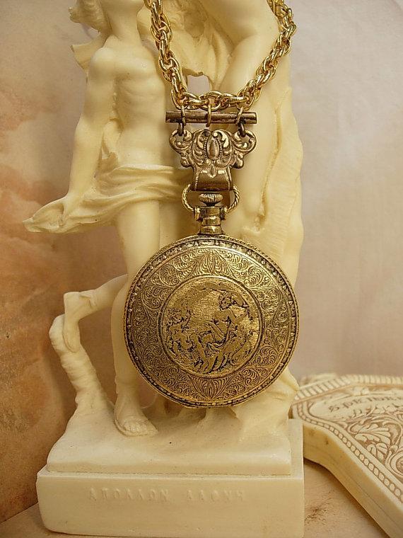 VIntage Nouveau pocketwatch compact necklace with raised nudes and antique hanger