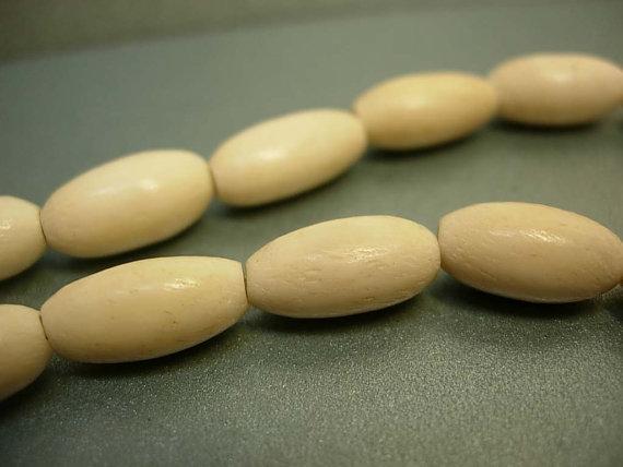 Vintage bone or preban ivory Egyptian revival necklace Queen Nefertiti carved beads