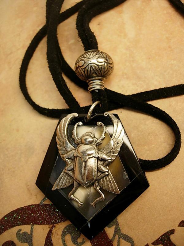 Onyx scarab talisman necklace with eerie agate that catches the moon