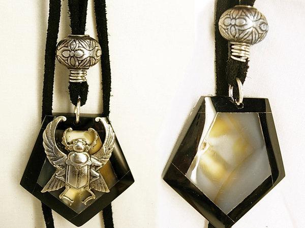 Onyx scarab talisman necklace with eerie agate that catches the moon