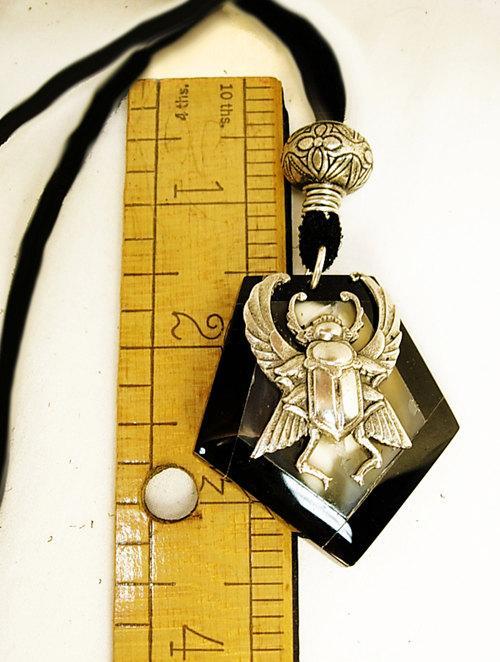 Onyx scarab talisman necklace with eerie agate that catches the moon