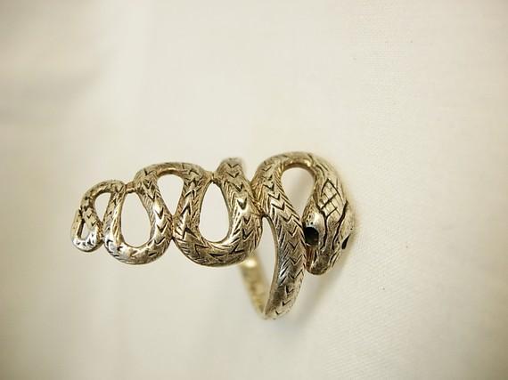 Sterling snake ring with a serpent that crawls down your finger