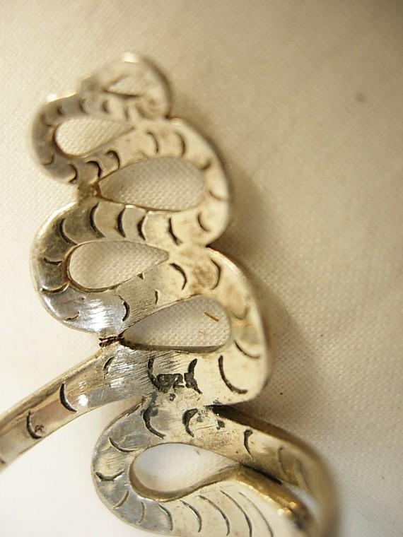 Sterling snake ring with a serpent that crawls down your finger
