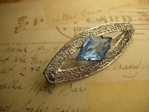 Antique Deco Filigree brooch faceted blue stone