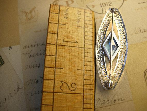 Antique Deco Filigree brooch faceted blue stone