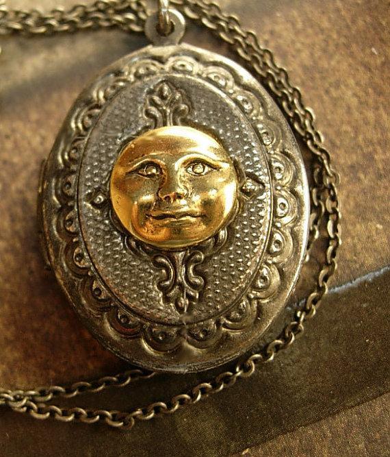 Vintage gunmetal moon locket Whimsical face in mixed metals