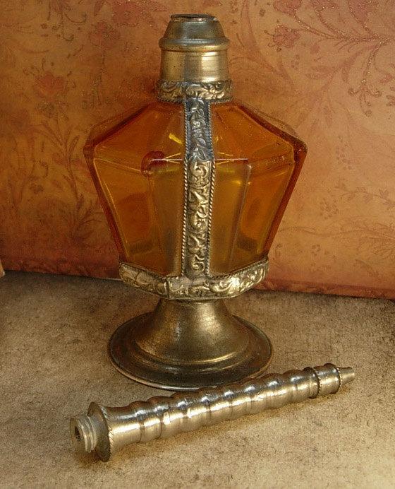 Antique Rosewater bottle signed ornate metalwork with amber glass bottle