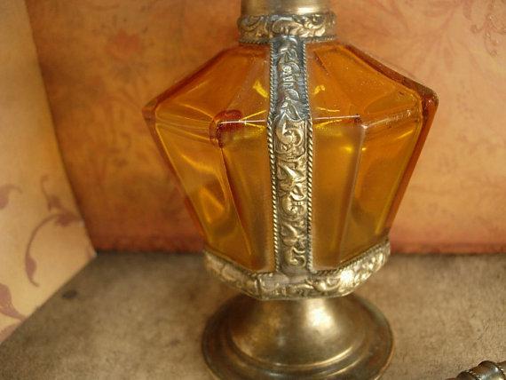 Antique Rosewater bottle signed ornate metalwork with amber glass bottle