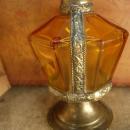 Antique Rosewater bottle signed ornate metalwork with amber glass bottle