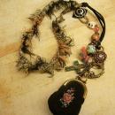 Strange Aunt Emmas bag of tricks necklace antique miniature coin purse and evil eyes