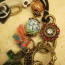 Strange Aunt Emmas bag of tricks necklace antique miniature coin purse and evil eyes
