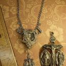 Religious Saint Necklace Vintage rhinestone dress clip antique religious medal goth necklace