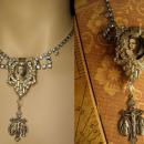 Religious Saint Necklace Vintage rhinestone dress clip antique religious medal goth necklace