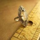 Art deco sterling citrine ring marcasite accents in a marquise setting