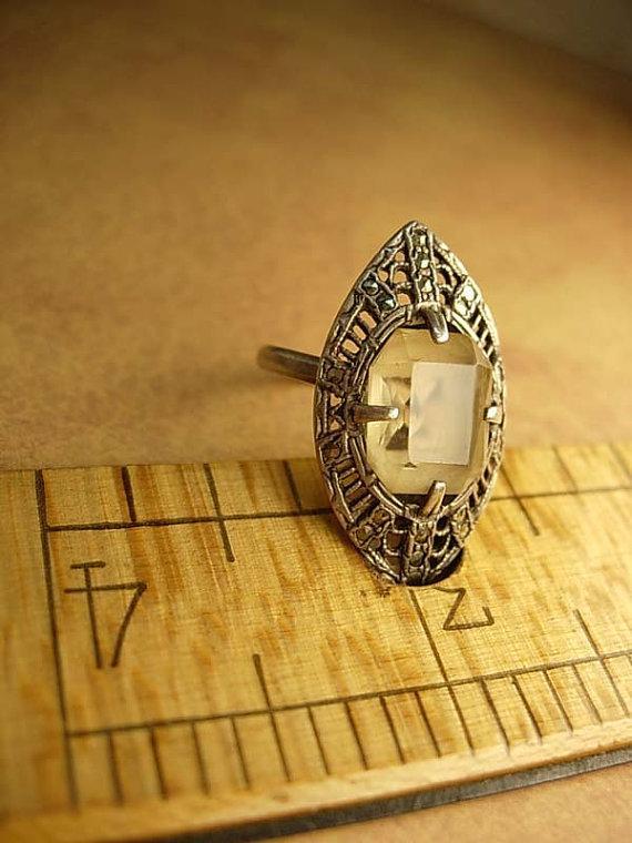 Art deco sterling citrine ring marcasite accents in a marquise setting