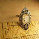 Art deco sterling citrine ring marcasite accents in a marquise setting