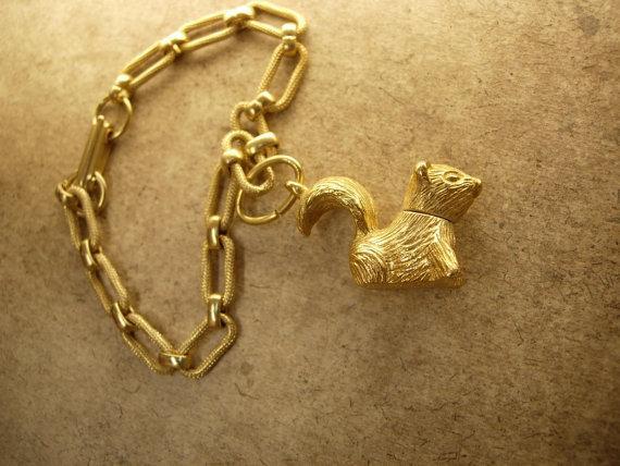 Vintage skunk perfume locket charm bracelet Little stinkers Charles Alton
