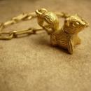 Vintage skunk perfume locket charm bracelet Little stinkers Charles Alton