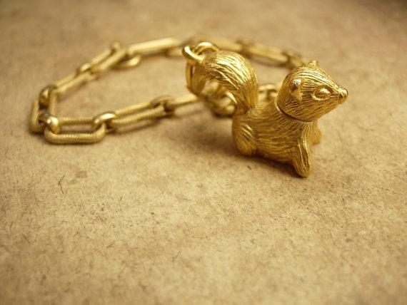 Vintage skunk perfume locket charm bracelet Little stinkers Charles Alton