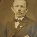 ANtique photo handlebar moustache gentleman with fraternal pin & handkerchief wireframe glasses INTERESTING history