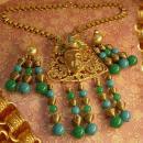 Hattie Carnegie Chinese figural signed bookchain buddha necklace and earrings Chandelier beads in turquoise