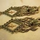 Gothic voodoo Snake earrings dripping in serpents