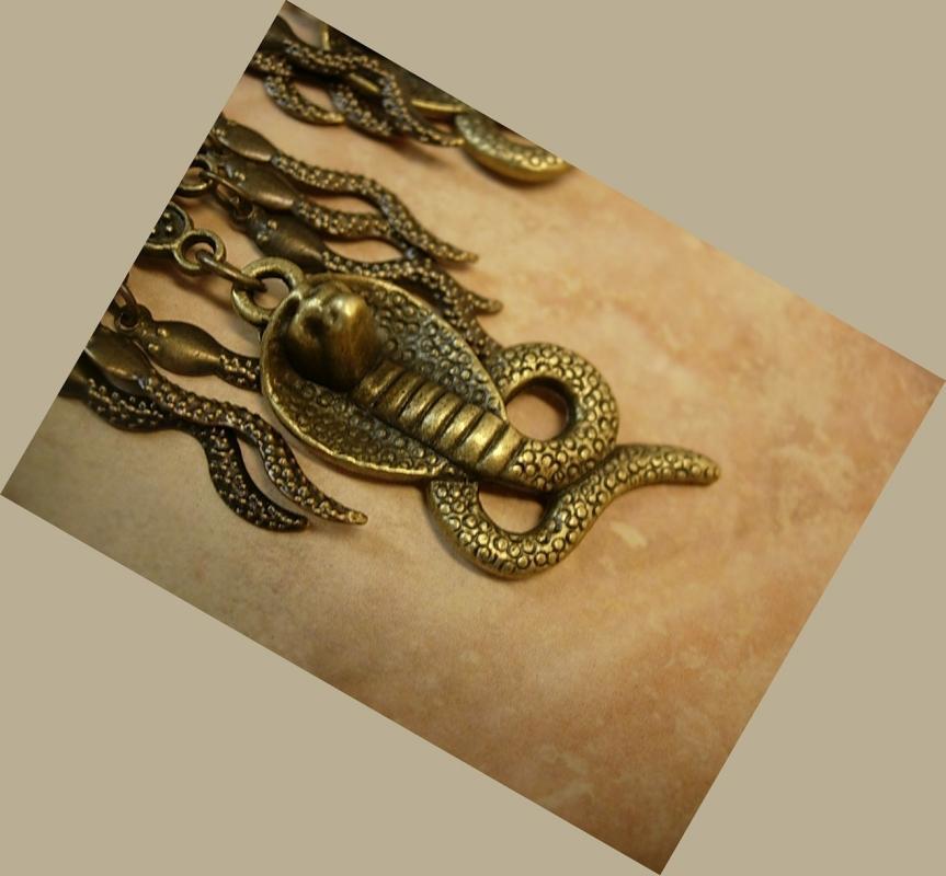 Gothic voodoo Snake earrings dripping in serpents