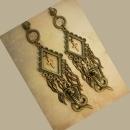 Gothic voodoo Snake earrings dripping in serpents