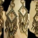 Gothic voodoo Snake earrings dripping in serpents