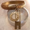 Vintage Charm Bracelet padlock and pocketwatch charms raised relief bangle