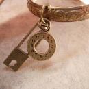 Vintage Charm Bracelet padlock and pocketwatch charms raised relief bangle