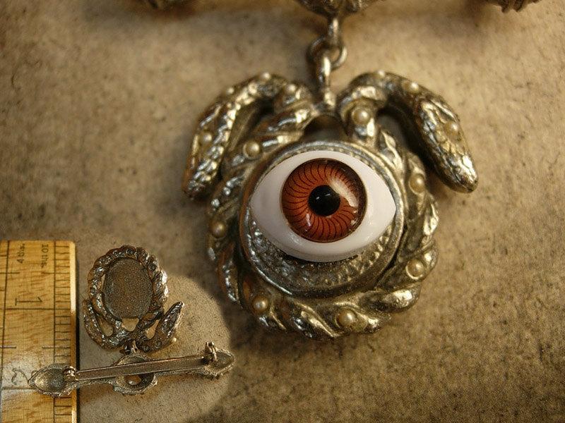 Bizarre Evil eye serpent talisman brooch jeweled serpents hoodoo voodoo