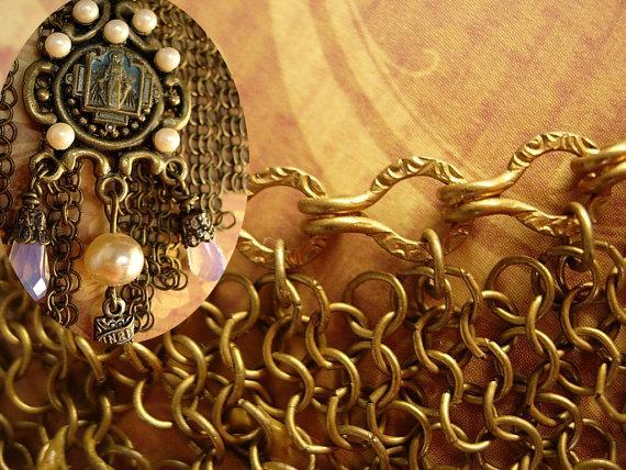 Vintage 1920's necklace Loaded with Fringe and religious medal and crucifix