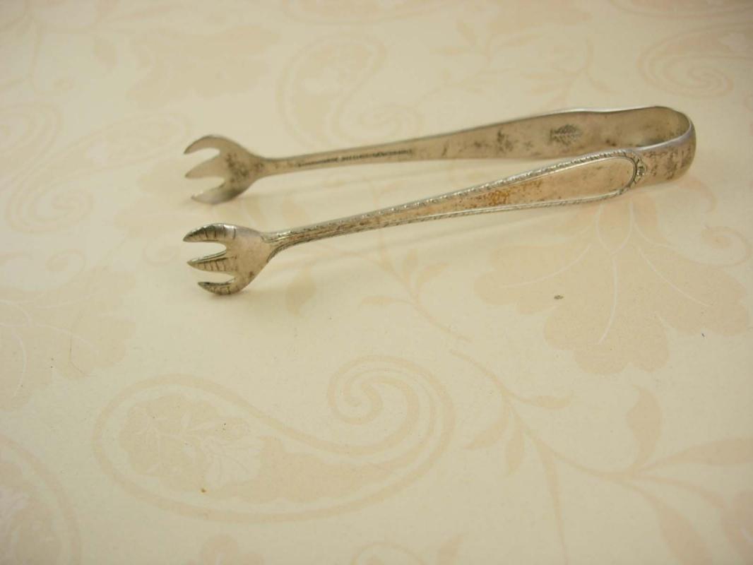 Antique sterling hallmarked Bird claw sugar tongs hallmarked
