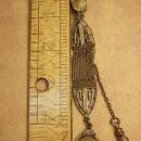ANtique watch fob locket with little girl photo Flip fob ornate metal work