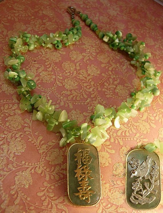 Chunky jade flowered necklace with jeweled bird pendant