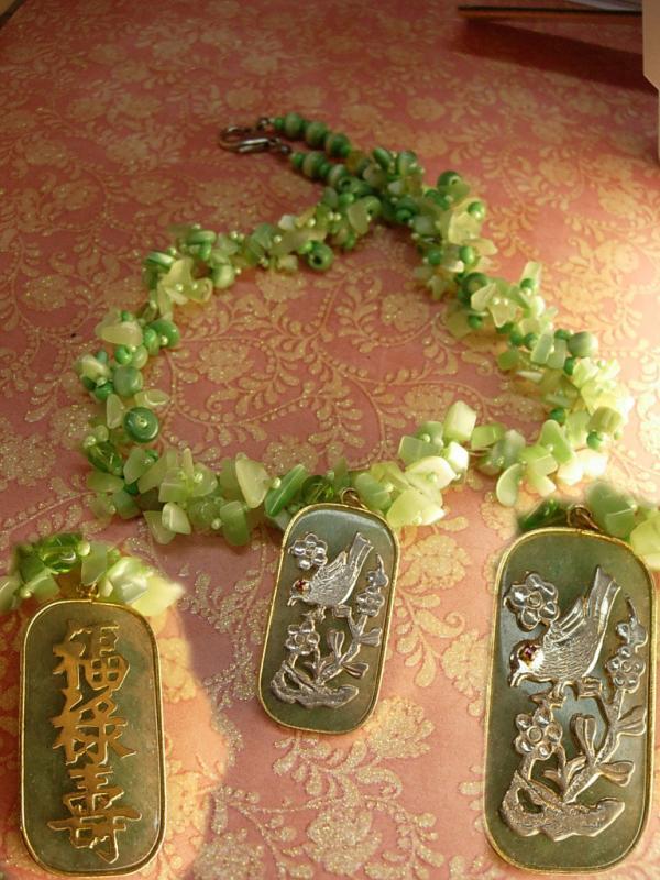 Chunky jade flowered necklace with jeweled bird pendant