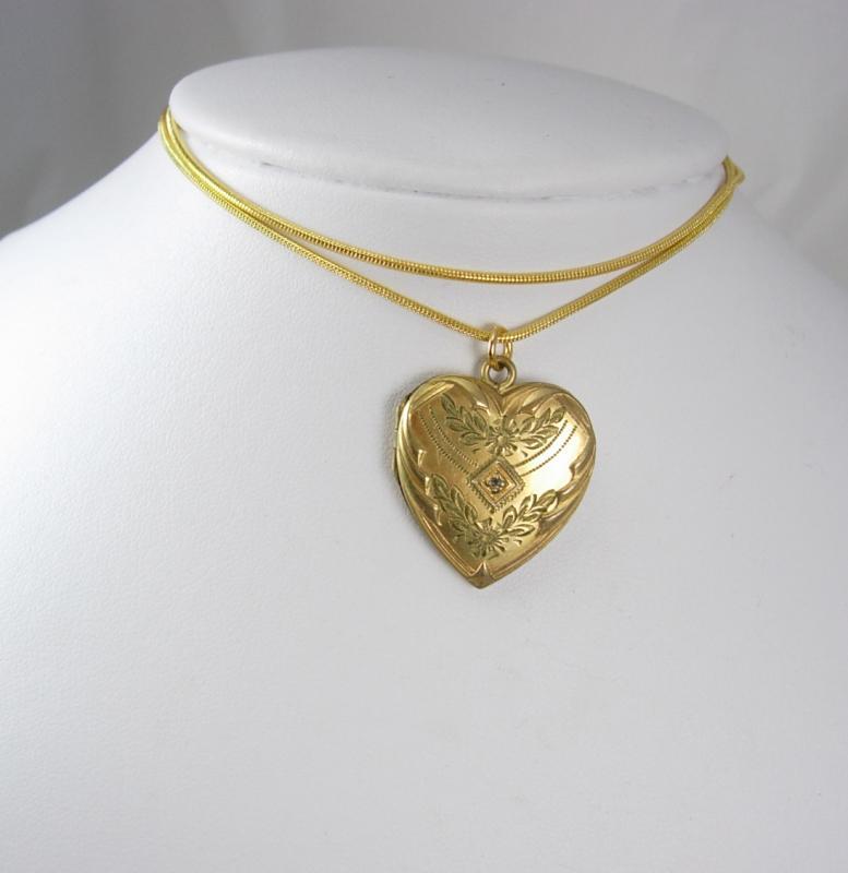 Antique heart locket diamond center yellow green and rose gold sweetheart