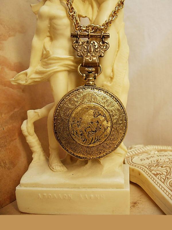 VIntage Nouveau pocketwatch compact necklace with raised nudes and antique hanger