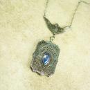 Vintage sterling Art Deco necklace filigree pendant with blue glass marquise stone