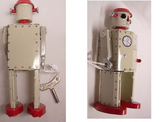 VIntage wind up Robot with key Japanese tin litho and he works great