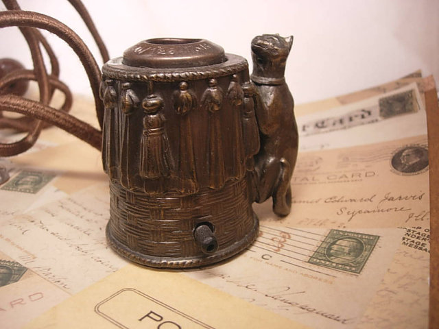 ANtique electric CAT Cigar lighter with magical powers